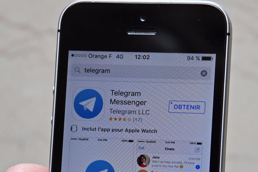 This picture taken on Sept. 15, 2016, in Paris shows an illustration of the Telegram messenger application on a smartphone.