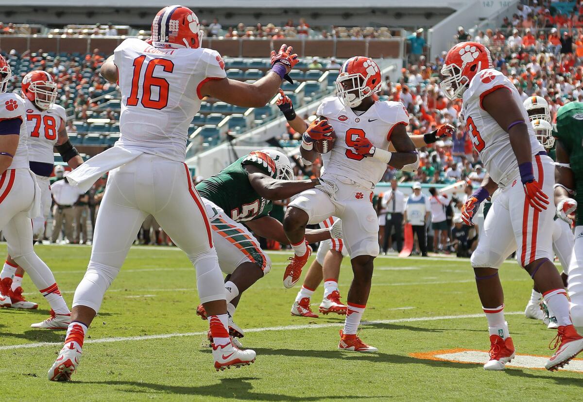 Clemson's Wayne Gallman rushes for a touchdown during the Tigers' 58-0 rout over Miami.