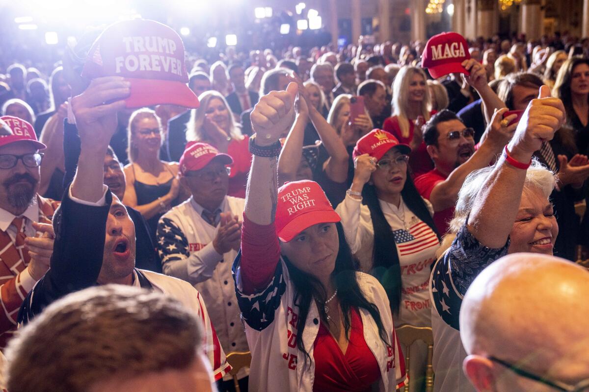 Supporters cheer former President Trump