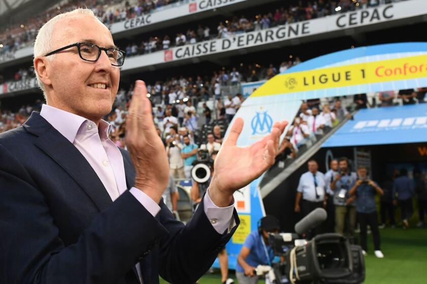 Olympique de Marseille's US owner Frank McCourt applauds as he attends the French L1 football match between Olympique de Marseille (OM) and Toulouse at the Velodrome stadium, in Marseille, on August 10, 2018. (Photo by Boris HORVAT / AFP) (Photo credit should read BORIS HORVAT/AFP/Getty Images) ** OUTS - ELSENT, FPG, CM - OUTS * NM, PH, VA if sourced by CT, LA or MoD **