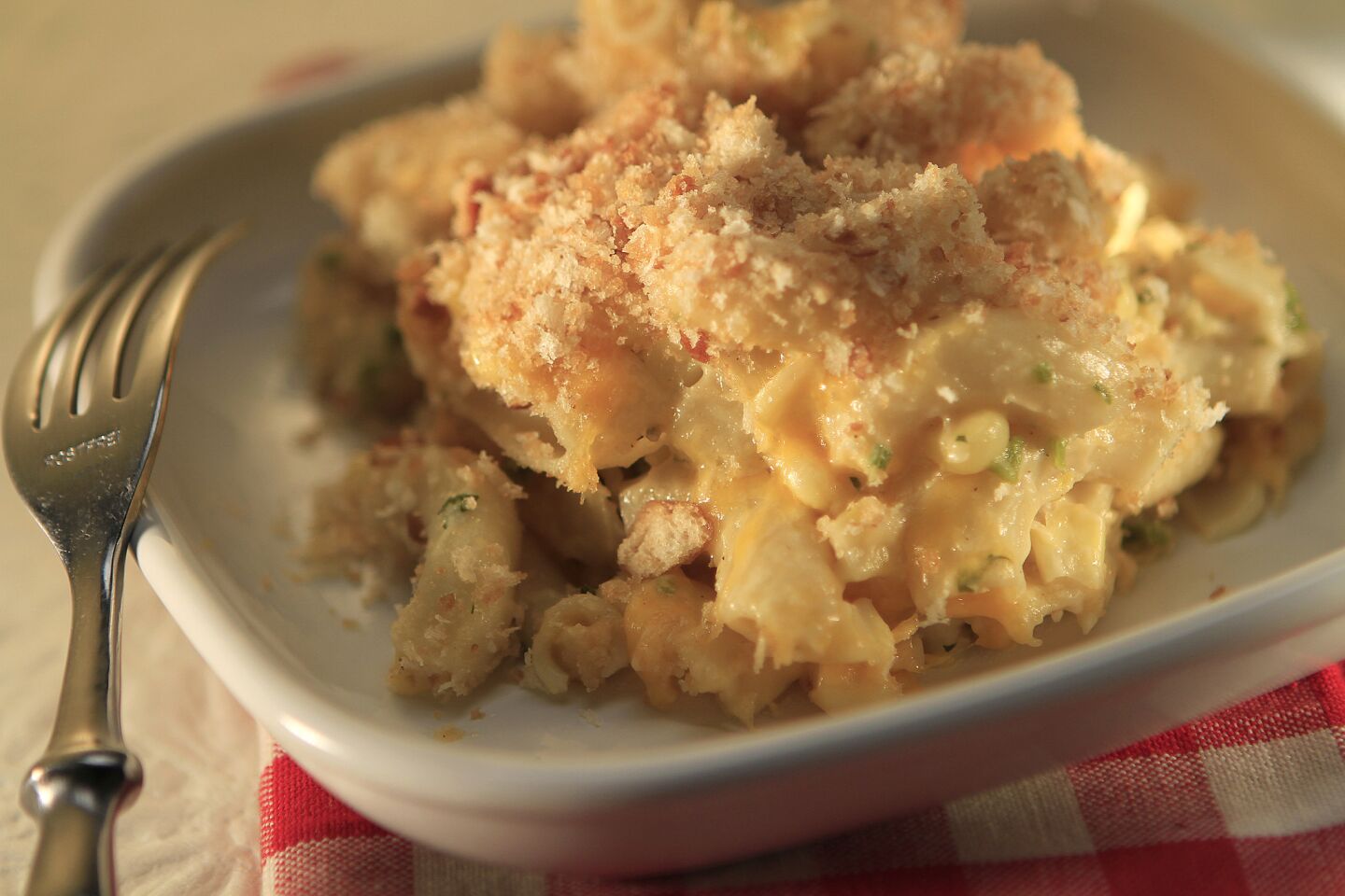 Add extra flavor with a touch of barbecue sauce, corn niblets and fresh parsley. Recipe: Famous Dave's mac 'n' cheese