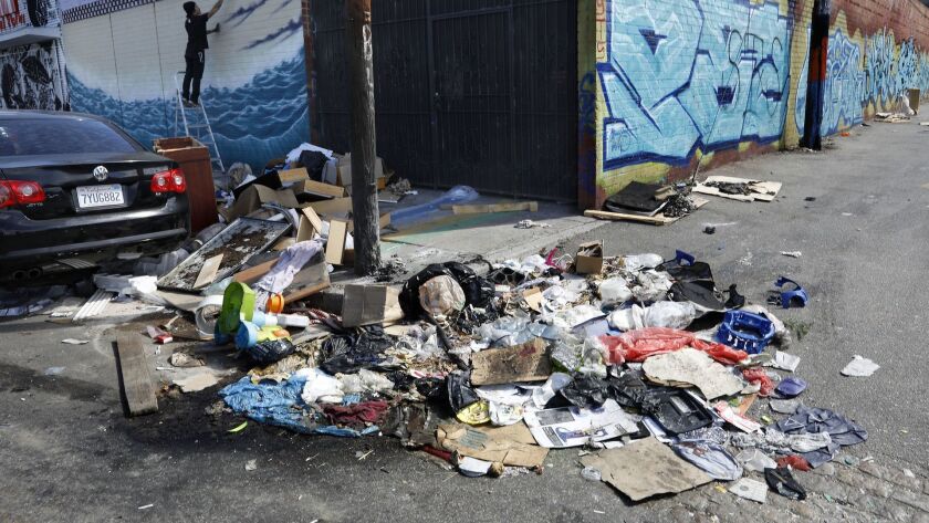 A pile of trash sits uncollected last fall in downtown L.A.'s Fashion District, where officials suspected a typhus outbreak. Trash can attract rats, which can carry fleas that spread typhus.