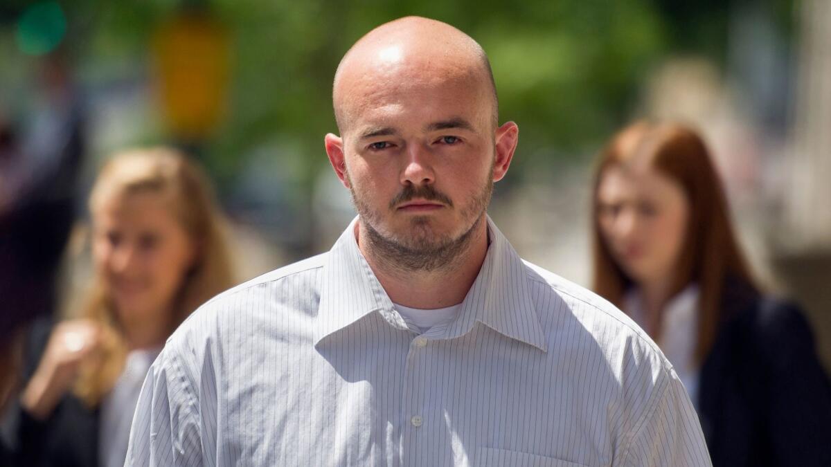 Former Blackwater security guard Nicholas Slatten, here in 2014 photo, is entitled to a new trial, an appeals court ruled. Slatten is serving a life sentence for his role in the killings of 14 Iraqi civilians in 2007.