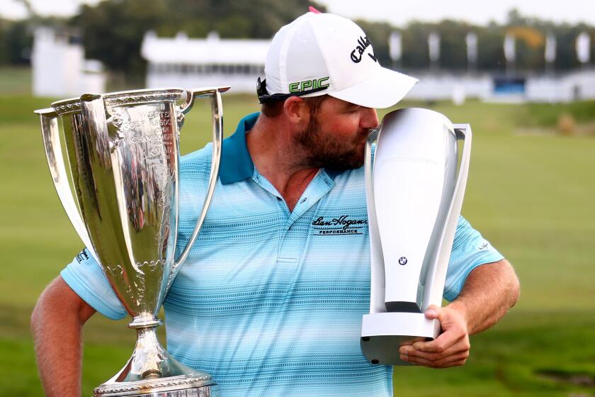 LAKE FOREST, IL - SEPTEMBER 17: Marc Leishman of Australia poses with the Wadley Cup and the BMW Championship Trophy after winning the BMW Championship at Conway Farms Golf Club on September 17, 2017 in Lake Forest, Illinois. (Photo by Gregory Shamus/Getty Images) ** OUTS - ELSENT, FPG, CM - OUTS * NM, PH, VA if sourced by CT, LA or MoD **