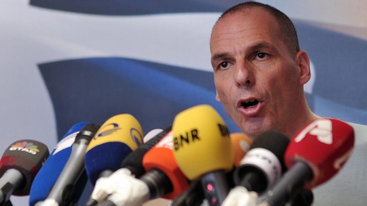 Greek Finance Minister Yanis Varoufakis speaks Sunday in Athens after the results of the bailout referendum.