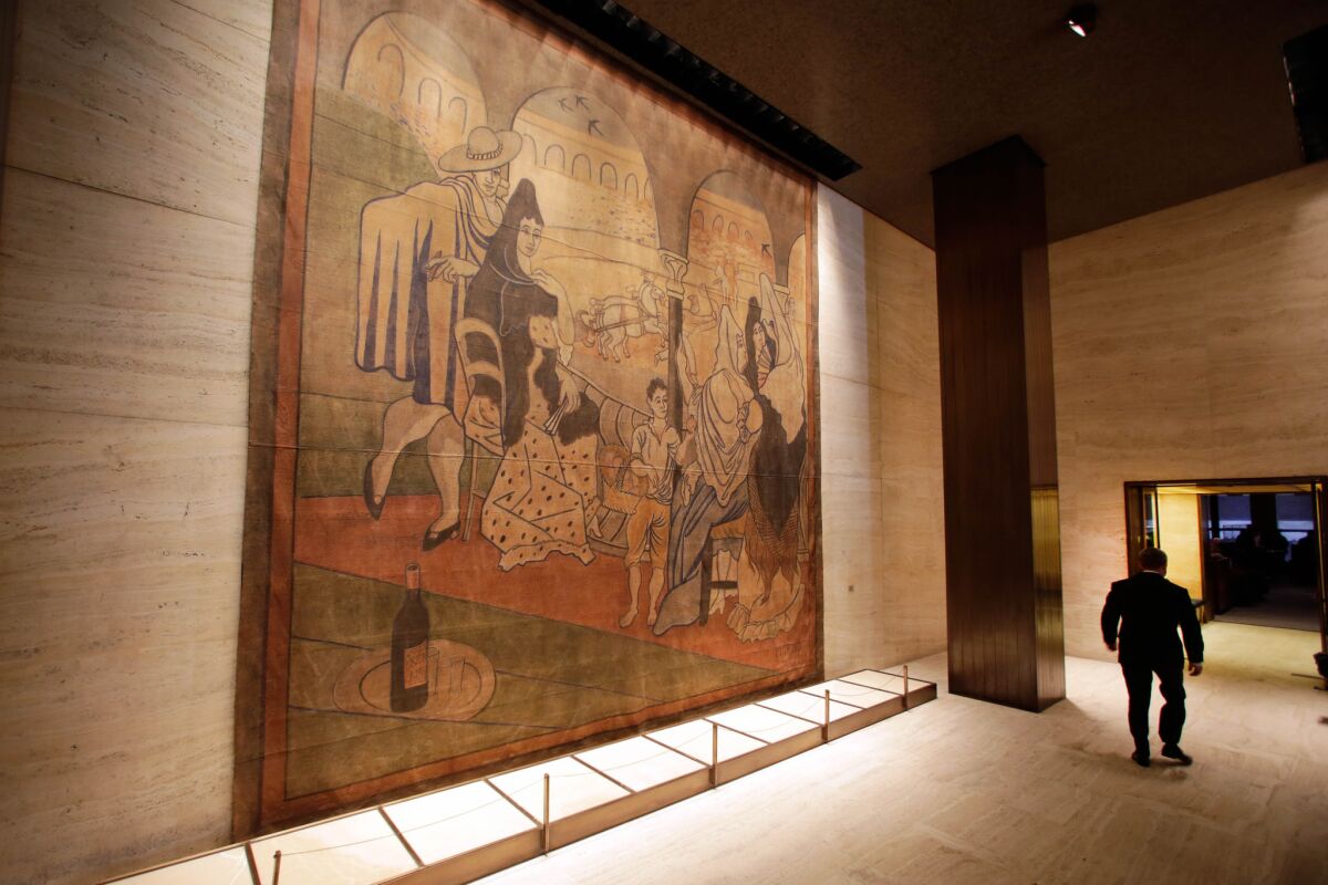 Picasso's "Le Tricorne," a stage curtain measuring 19 feet by 20 feet, is shown in its former home at the Seagram Building in New York.
