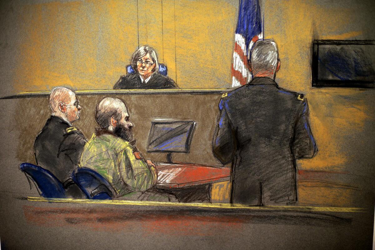 In a courtroom sketch, convicted Ft. Hood gunman Maj. Nidal Hasan, center, sits before the judge, Army Col. Tara Osborn, during the sentencing phase of his trial.