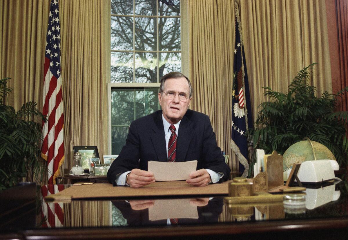 President George H.W. Bush addresses the nation on television on Dec. 20, 1989, from the Oval Office in Washington as he explains his decision to deploy American troops to Panama.