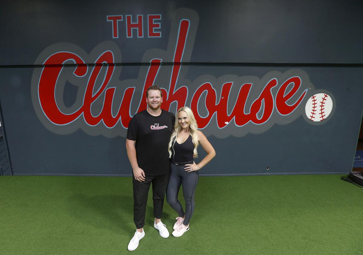 Former Major League Baseball pitcher Brooks Pounders and his wife, Lucia, own the Clubhouse baseball facility in Costa Mesa.