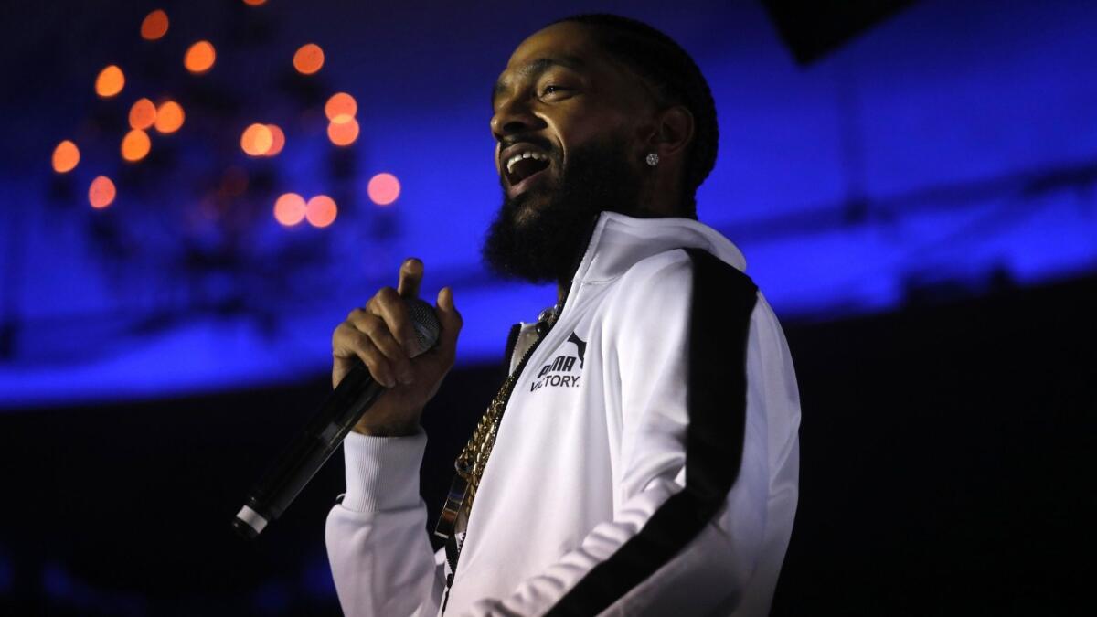 Nipsey Hussle performs at the Hollywood Palladium in February 2018. A public memorial service for the slain rapper was held Thursday at Los Angeles' Staples Center.