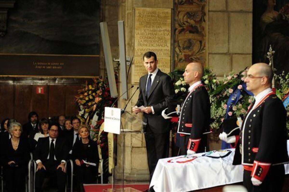 Spain's Crown Prince Felipe, third right, speaks during a farewell ceremony for former International Olympic Committee president Juan Antonio Samaranch in the Palau of Generalitat in Barcelona, Spain, on Thursday, April 22, 2010 ahead of Samaranch's funeral later in the day. Former International Olympic Committee president Juan Antonio Samaranch died Wednesday at age 89 in the Quiron Hospital in his home city of Barcelona of cardio-respiratory failure three days after being admitted with heart problems. (AP Photo/David Ramos)