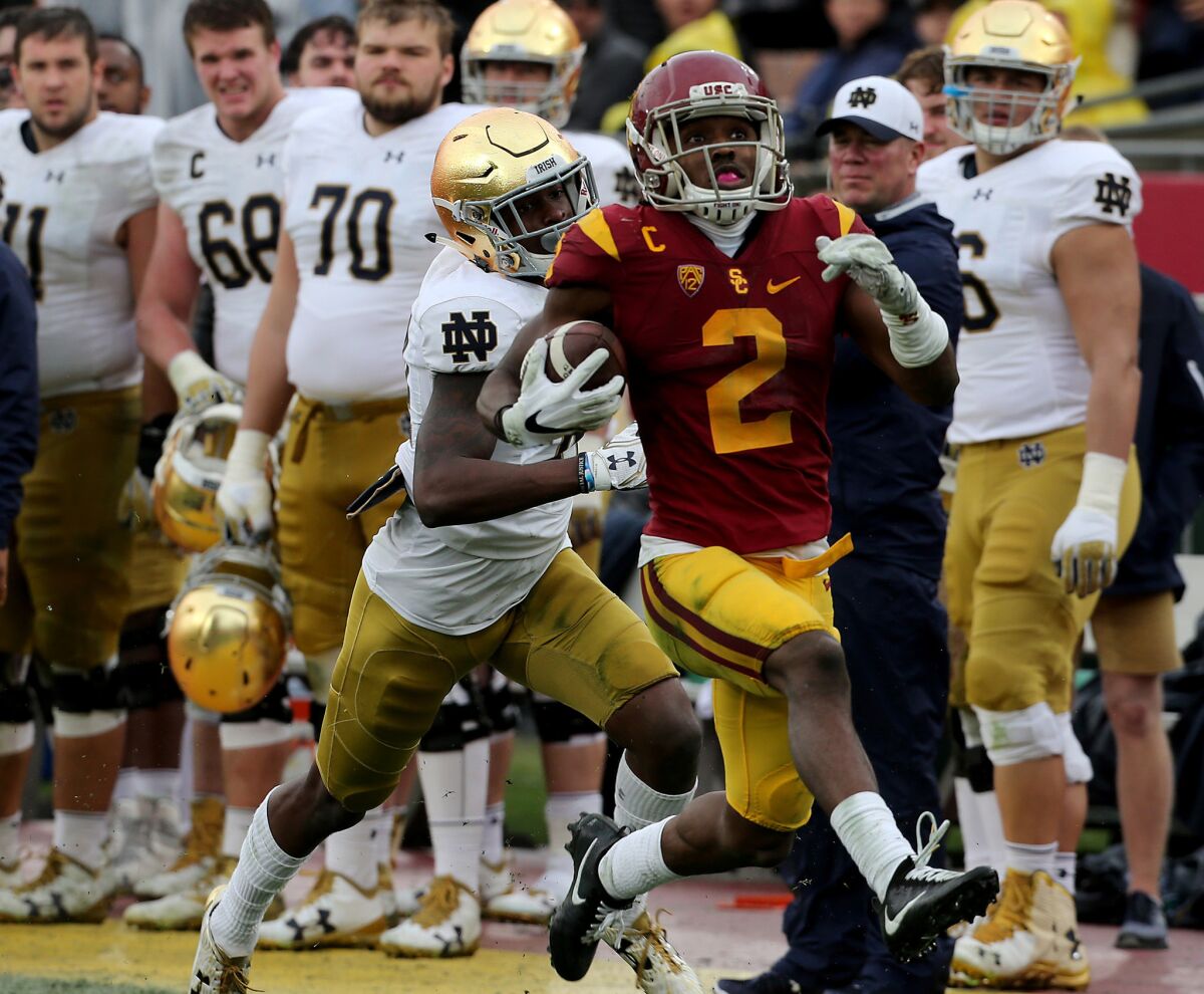 USC cornerback Adoree' Jackson returns a punt 55 yards for a touchdown against Notre Dame in the second quarter of a game Saturday.