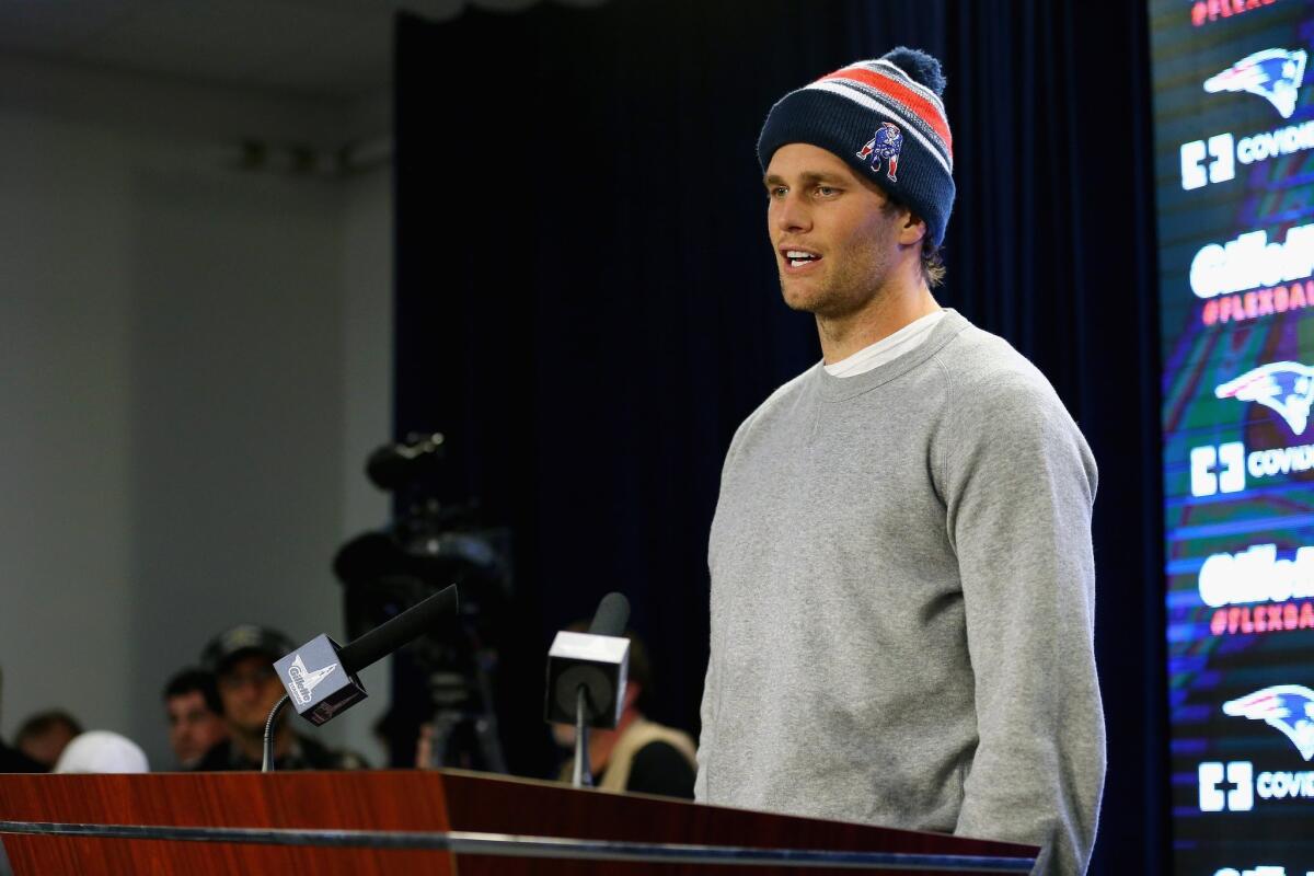 New England Patriots quarterback Tom Brady talks to the media during a news conference Thursday to address the under-inflation of footballs used in the AFC championship game.