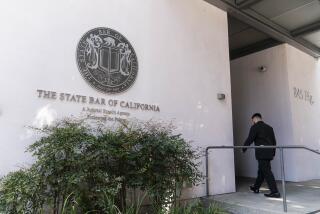 A man enters the State Bar of California building in Los Angeles, Tuesday, June 20, 2023. John Eastman, a former lawyer of Donald Trump is expected to spend the day testifying before the State Bar of California in a proceeding that could result in him losing his license to practice law in the state. He faces 11 disciplinary charges stemming from his development of a dubious legal strategy that was aimed at helping Trump remain in power by disrupting the counting of state electoral votes. (AP Photo/Jae C. Hong)