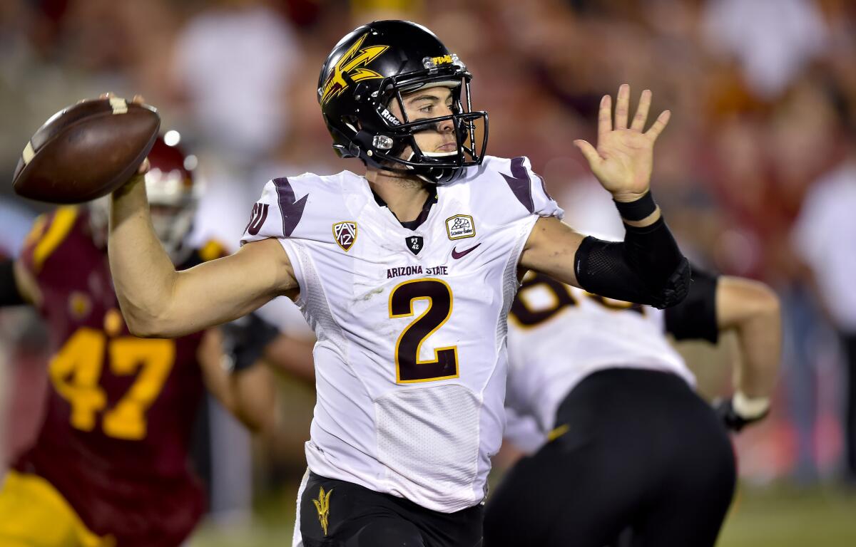 Arizona State quarterback Mike Bercovici looks for a receiver during the second half against USC.