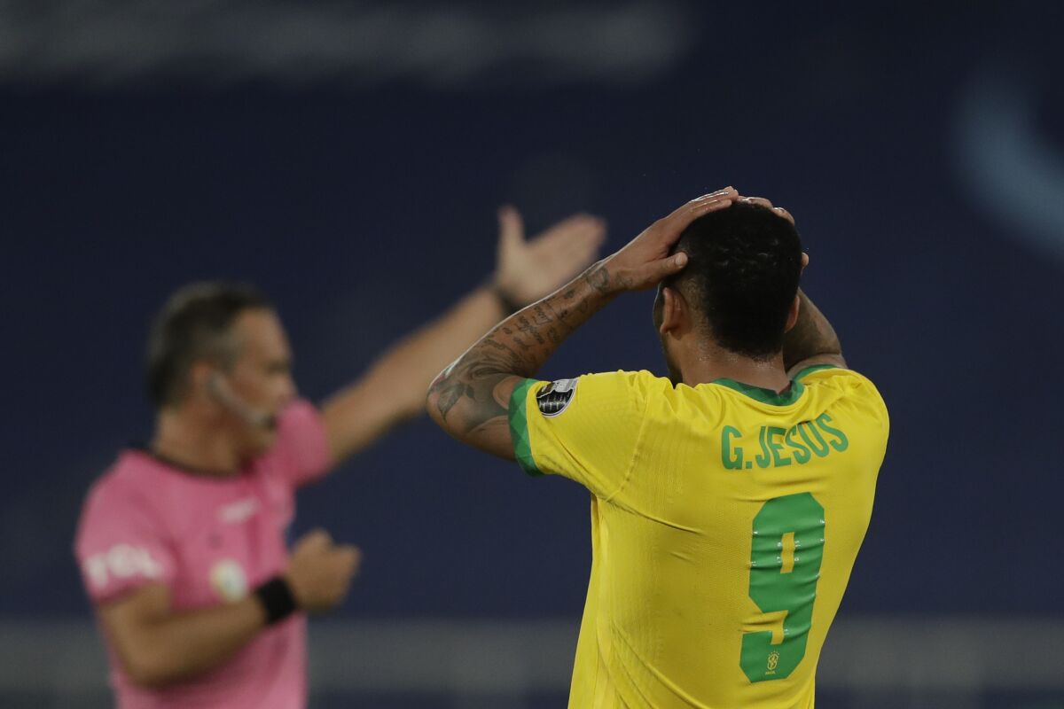 Brazil's Gabriel Jesus reacts after missing a chance to score during a Copa America quarterfinal soccer match against Chile at the Nilton Santos stadium in Rio de Janeiro, Brazil, Friday, July 2, 2021. (AP Photo/Silvia Izquierdo)