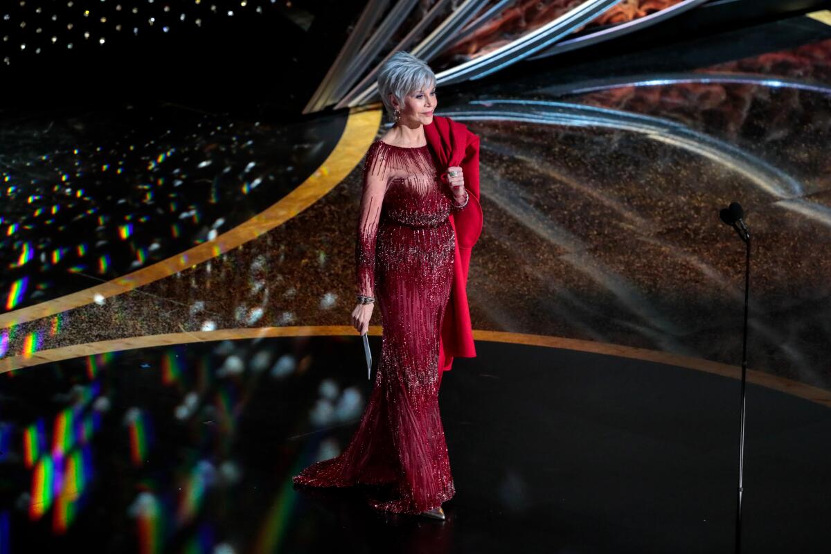 Presenter Jane Fonda onstage in a red gown during the telecast of the 92nd Academy Awards