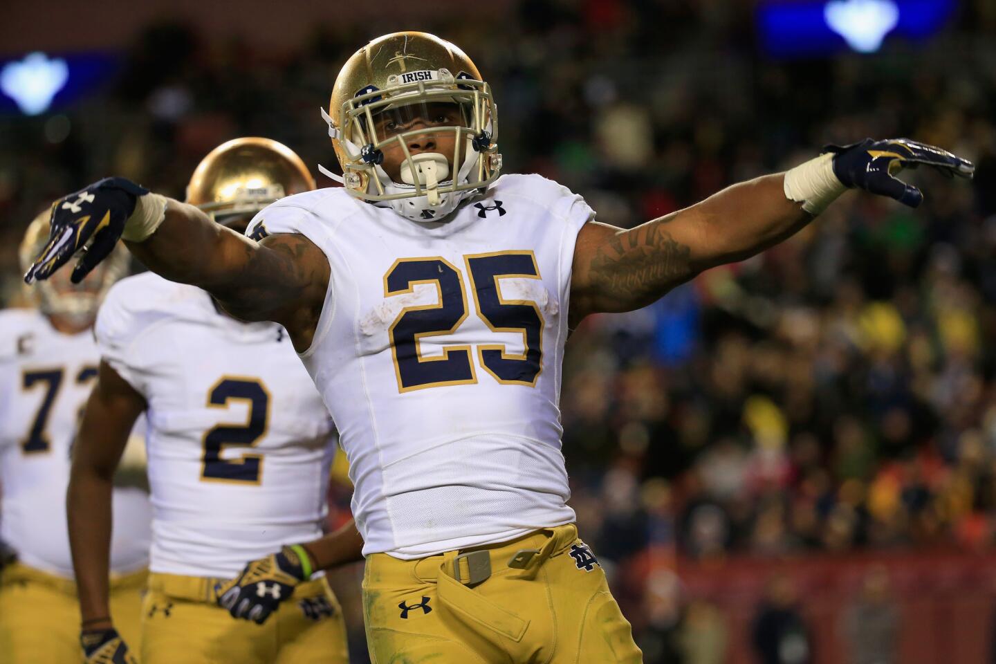 Notre Dame running back Tarean Folston celebrates after rushing for a fourth quarter touchdown.