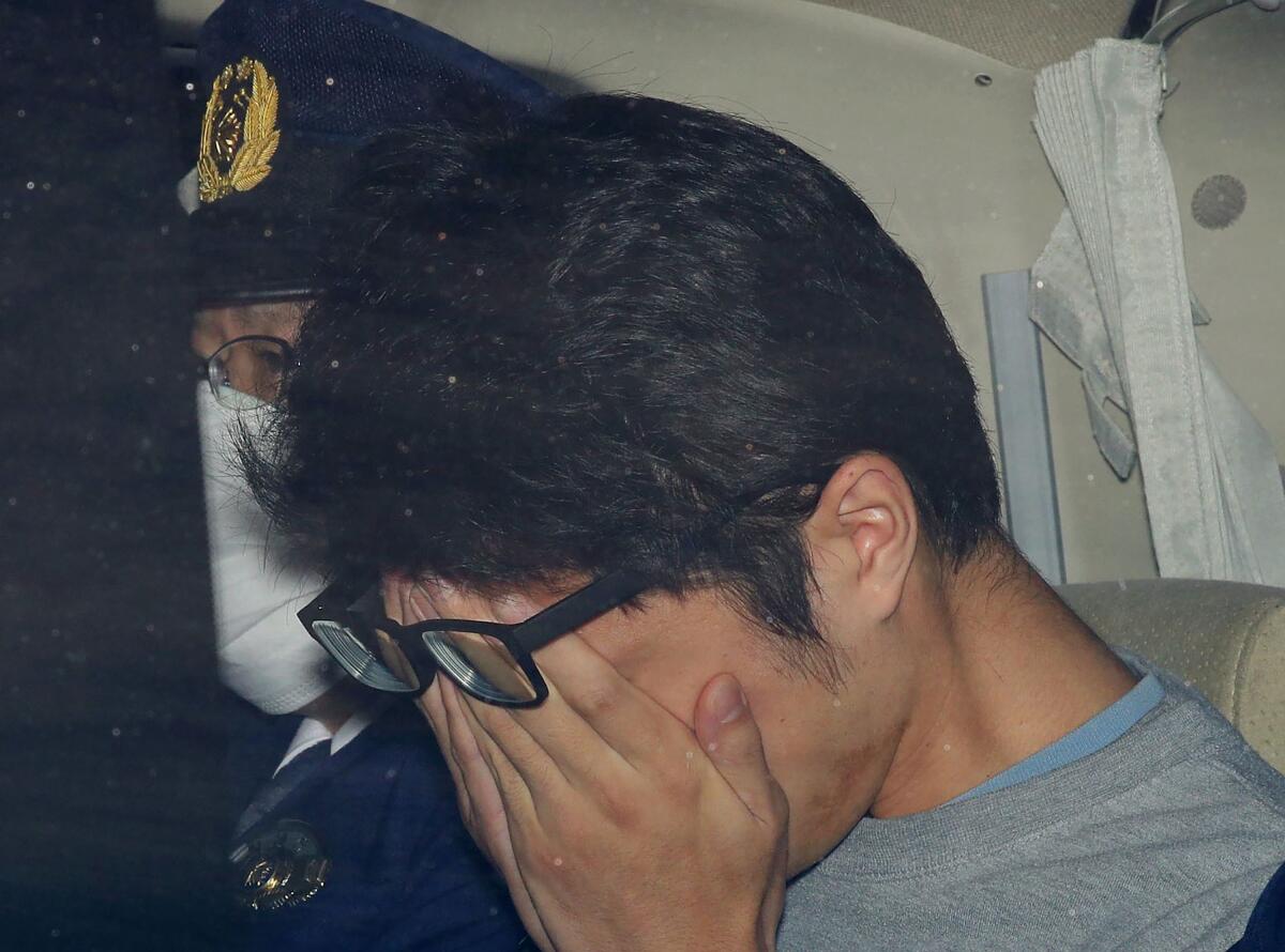 Takahiro Shiraishi leaves a police station in Tokyo in November 2017.
