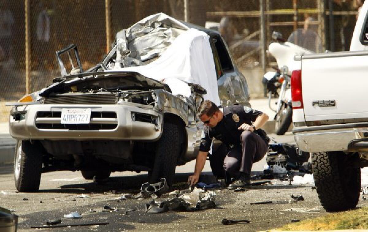 Police investigate a 2012 fatal crash in Woodland Hills, Calif. A report out Tuesday said the number of motor vehicle deaths was up 5% from 2011 to 2012.