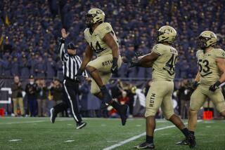 Army defensive lineman Nathaniel Smith (44) celebrates a sack against the Navy during the second quarter of an NCAA football game at Gillette Stadium Saturday, Dec. 9, 2023, in Foxborough, Mass. (AP Photo/Winslow Townson)