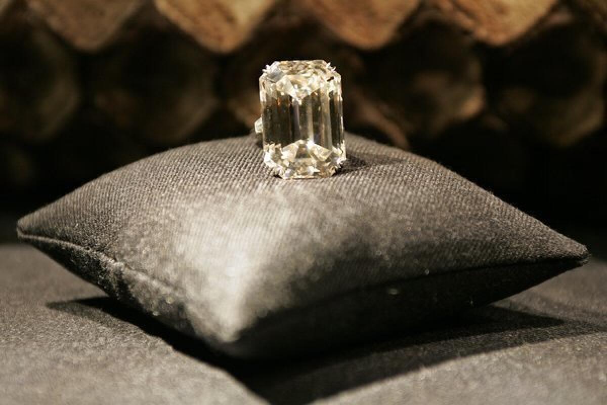 The 71.73-carat Lesotho diamond at Harry Winston Diamond Corp.'s flagship Beverly Hills salon. The company is buying a Canadian diamond mine for $500 million.