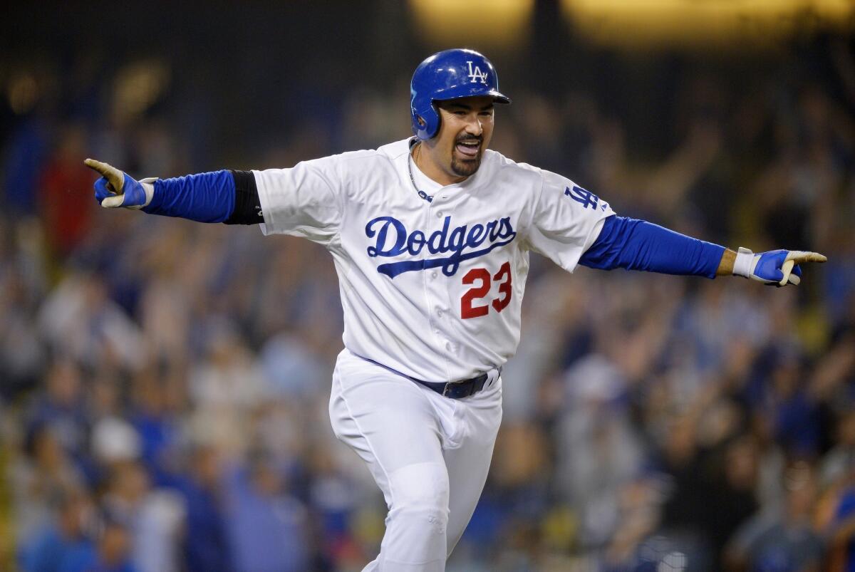 Dodgers first baseman Adrian Gonzalez celebrates after hitting a game-ending RBI double during Wednesday's victory over the New York Mets.