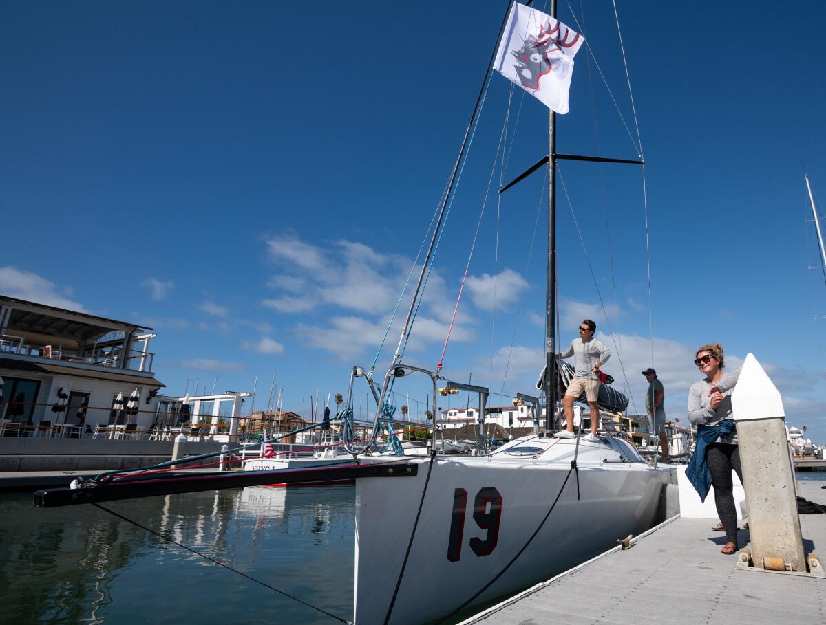 Boat owner Brett Scott, left, and crew member Scott Buchanan.