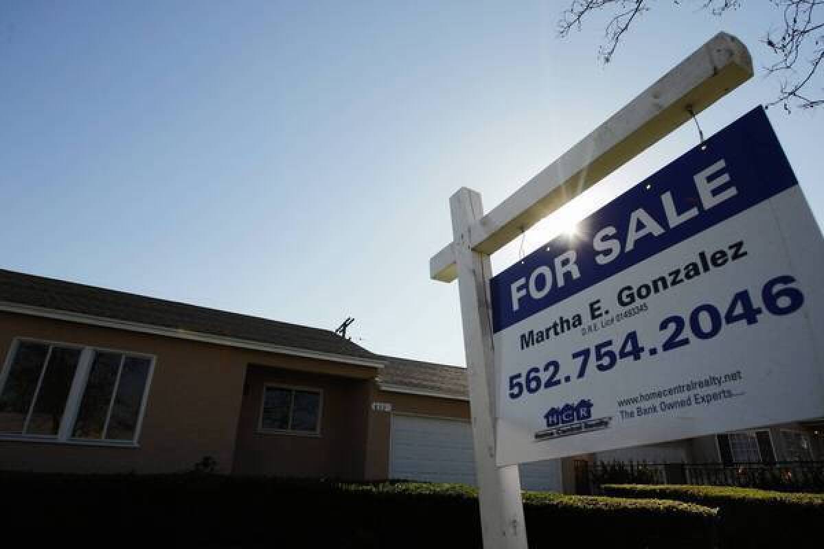 Southern California saw home prices up sharply in February from a year earlier. Above, a home for sale in Compton.