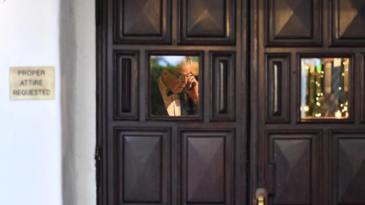 Maitre d' Bryan Ellis at Melvyn's, where he does his best to ensure diners respect the dress code. (Stuart Palley /For The Times)