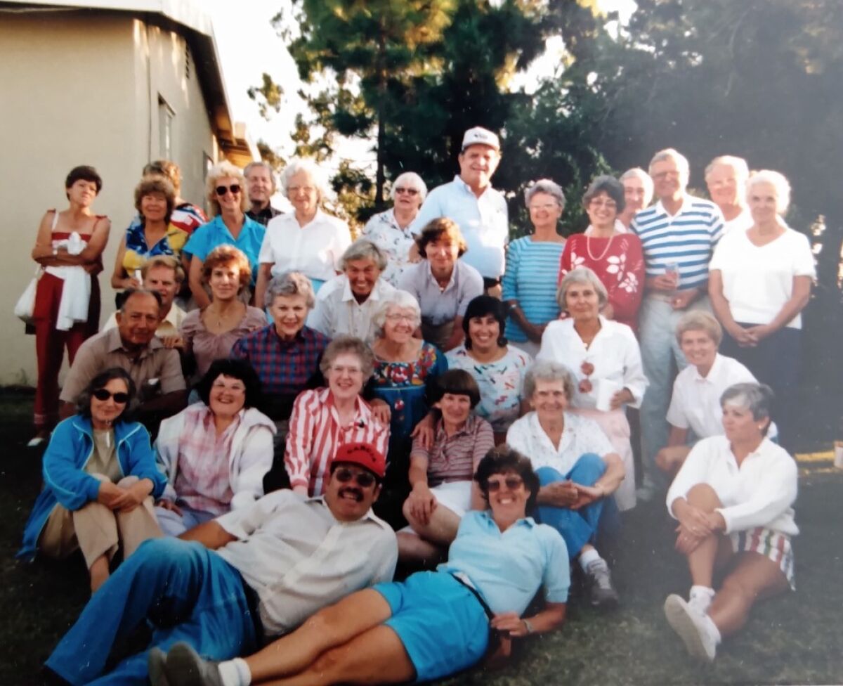 A Walkabout group poses in the 1980s.