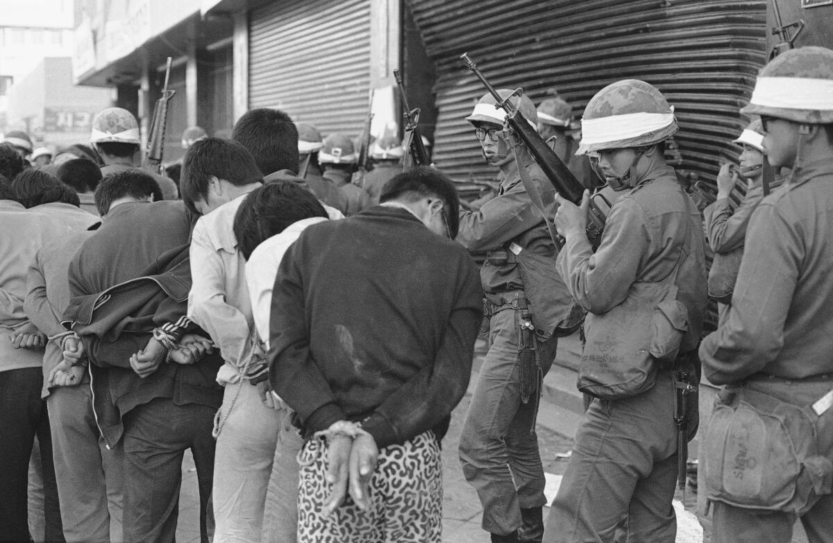 Korean Martial Law forces seized control of Gwangju in a predawn attack in 1980.