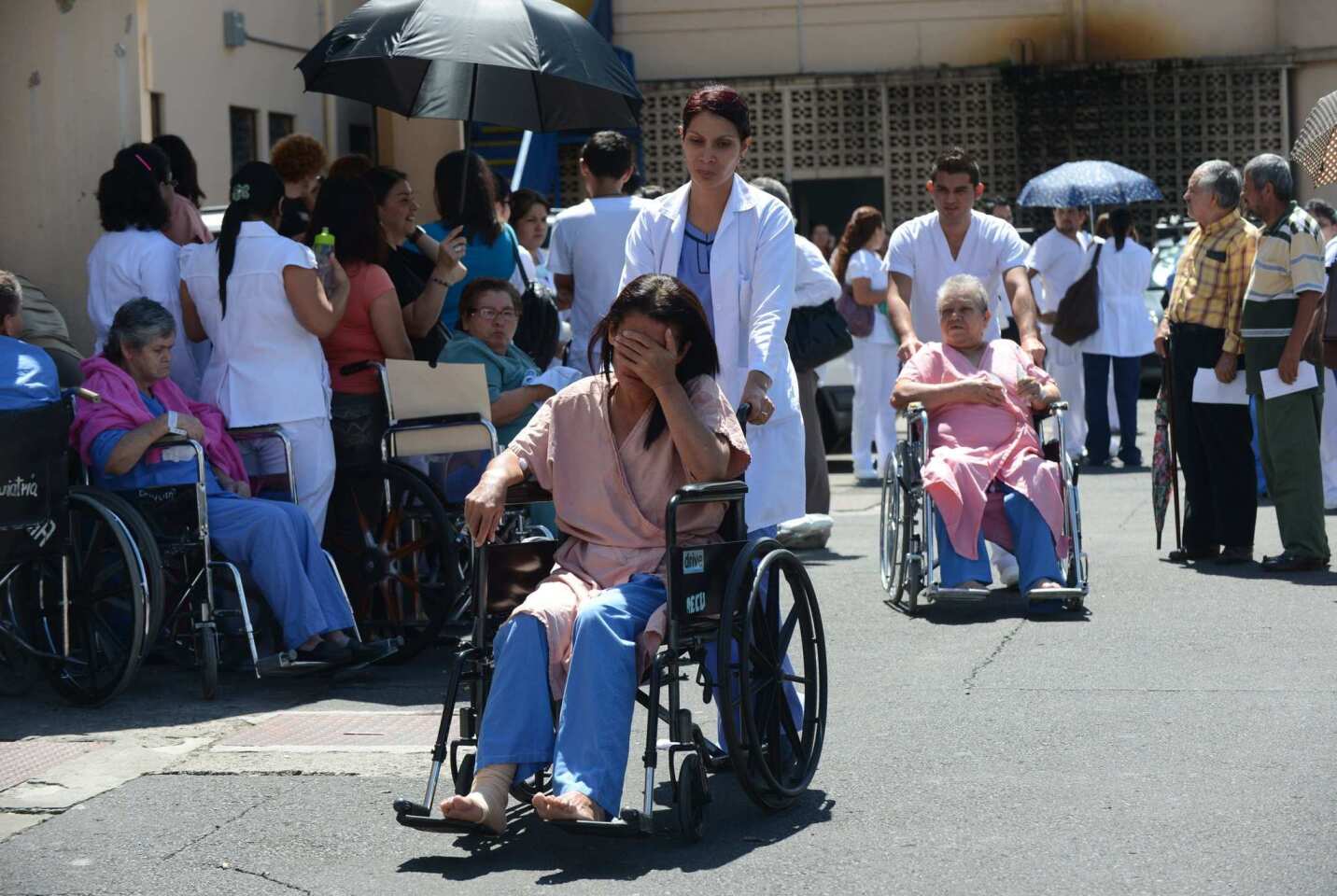 Patients at Calderon Guardia Hospital in San Jose, Costa Rica, are evacuated after the earthquake struck near the Pacific coast.