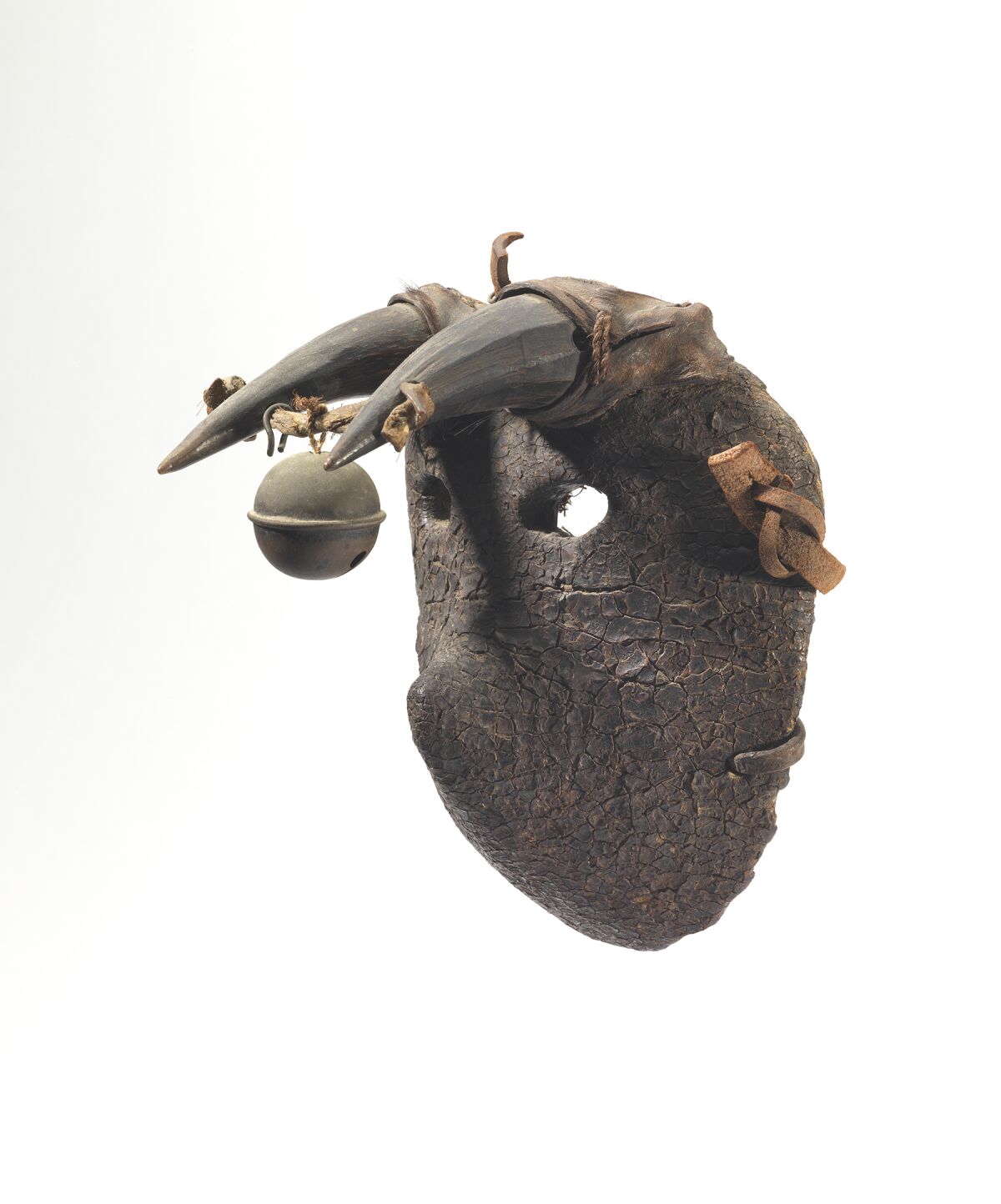 A Guatemalan bull mask crafted at some point in the late 19th or early 20th century, on view at the Fowler Museum.