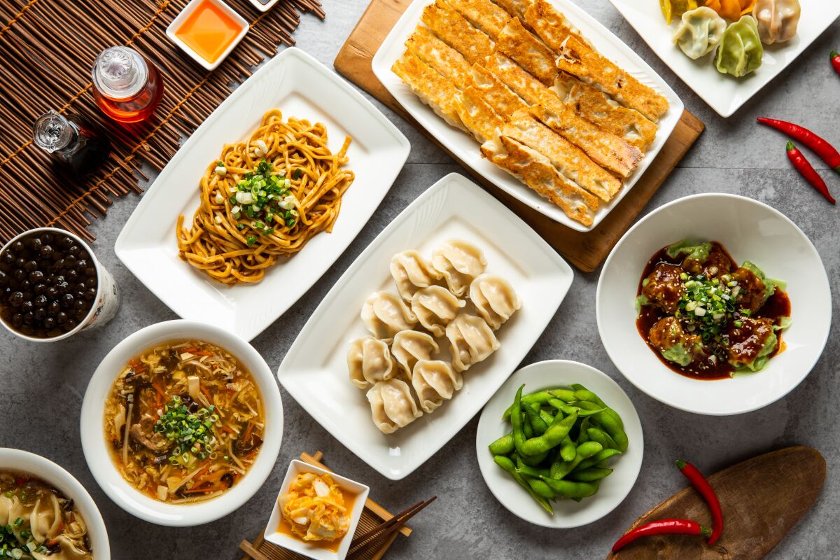 An overhead photo of a spread of dumplings, noodles and soups from Taiwanese dumpling shop Bafang Dumpling.