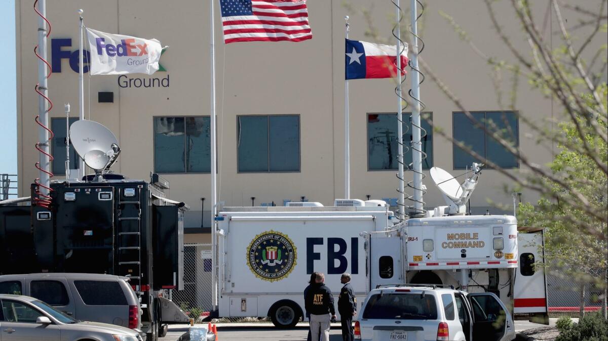 Authorities investigate an explosion at a FedEx facility in Schertz, Texas.