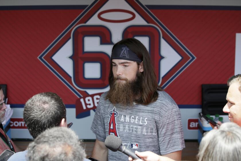 Los Angeles Angels' Brandon Marsh talks with the media before his debut game against the Seattle Mariners before a baseball game in Anaheim, Calif., Sunday, July 18, 2021. (AP Photo/Alex Gallardo)