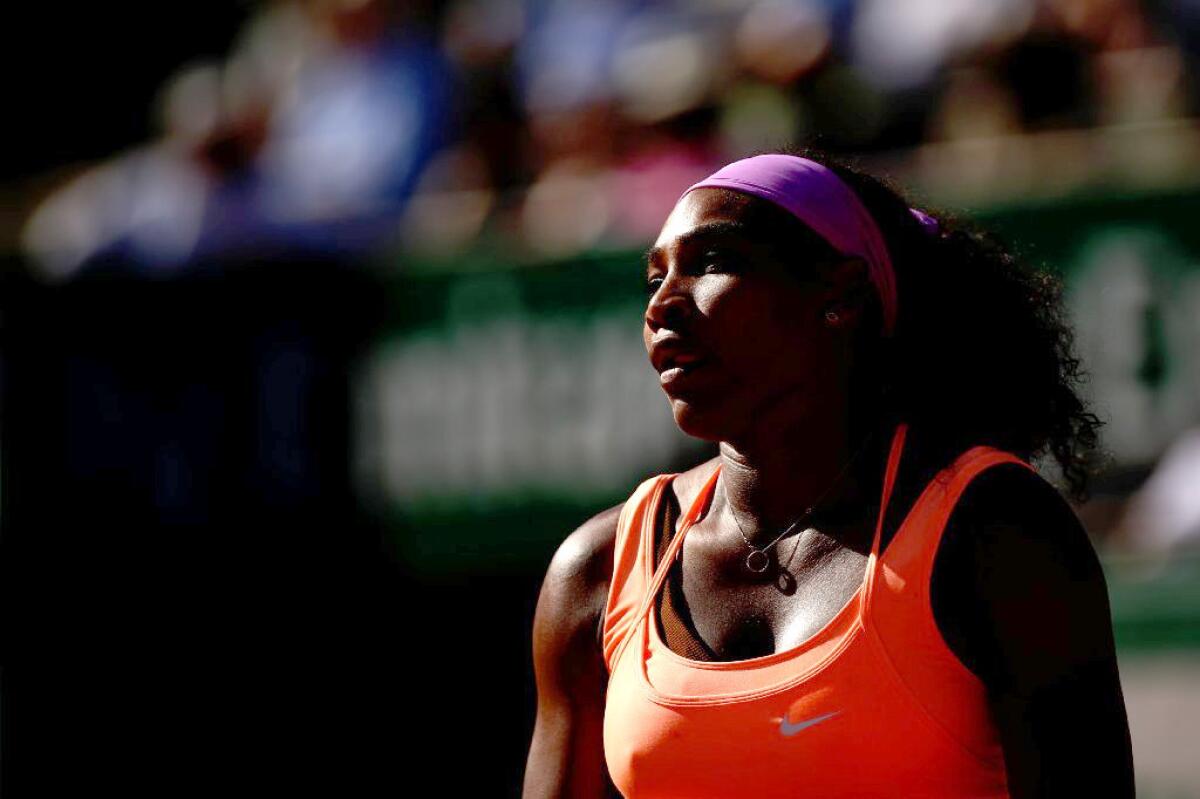 Serena Williams reacts during her semifinal victory at the French Open over Bacsinszky of Switzerland, 4-6, 6-3, 6-0.