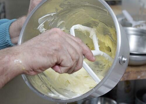 1: Mix together powdered sugar, butter, an egg yolk, flour and cream.