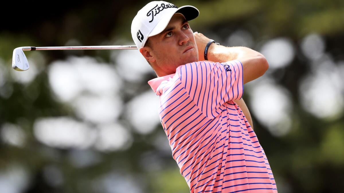 Justin Thomas watches his tee shot at No. 4 during the third round of the Sony Open on Saturday.