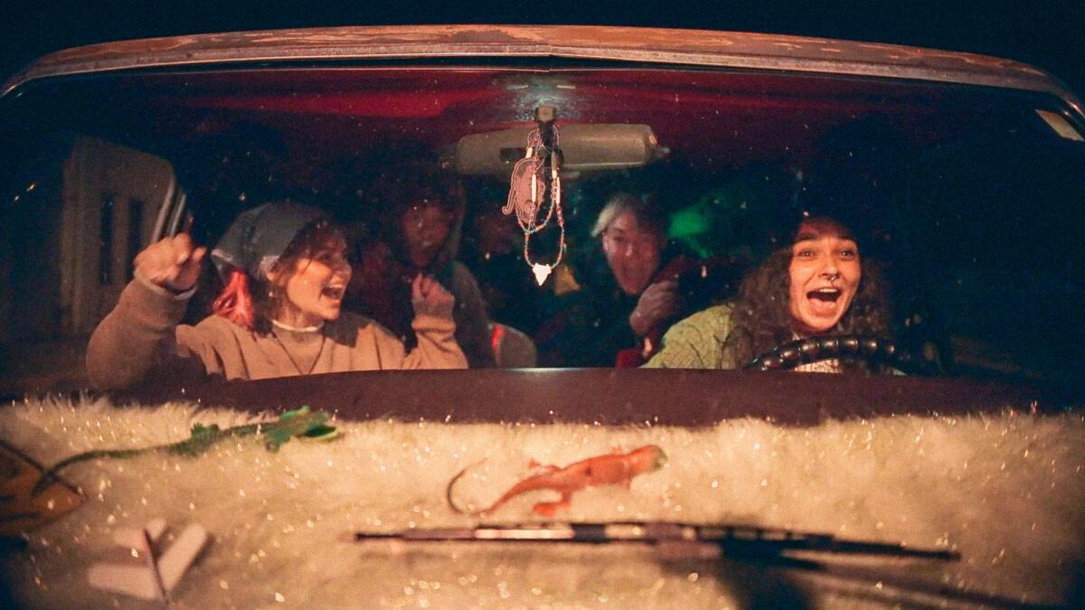 A gang of friends hits the road in a van.