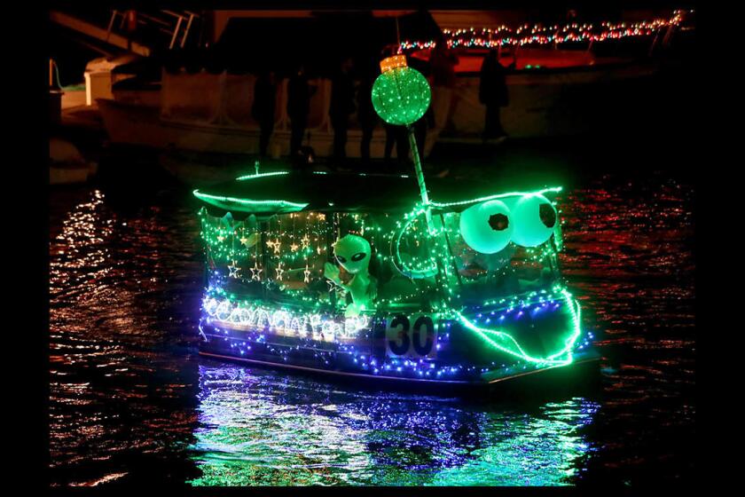 “We Come In Peace” was the message this boat's owner had for the annual Huntington Harbour Boat Parade in Huntington Beach on Saturday. The theme for this year was "Space Odyssey."