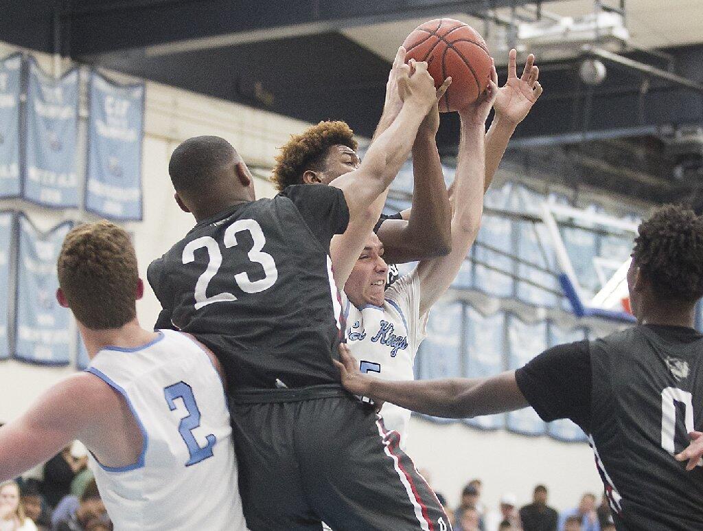 Corona del Mar High's Ben Coffman fights for an offensive rebound against Pasadena.