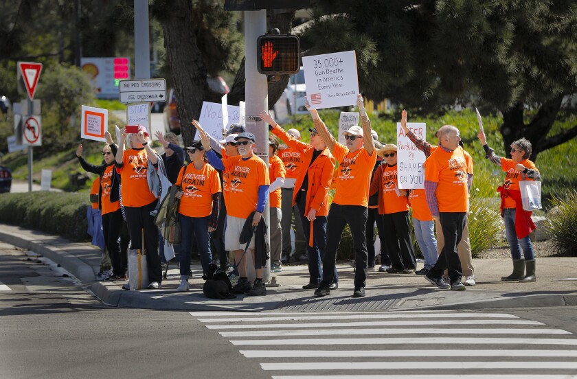 NeverAgainCa supporters demonstrate outside a Crossroads of the West Gun Show at the Del Mar Fairgrounds last year.