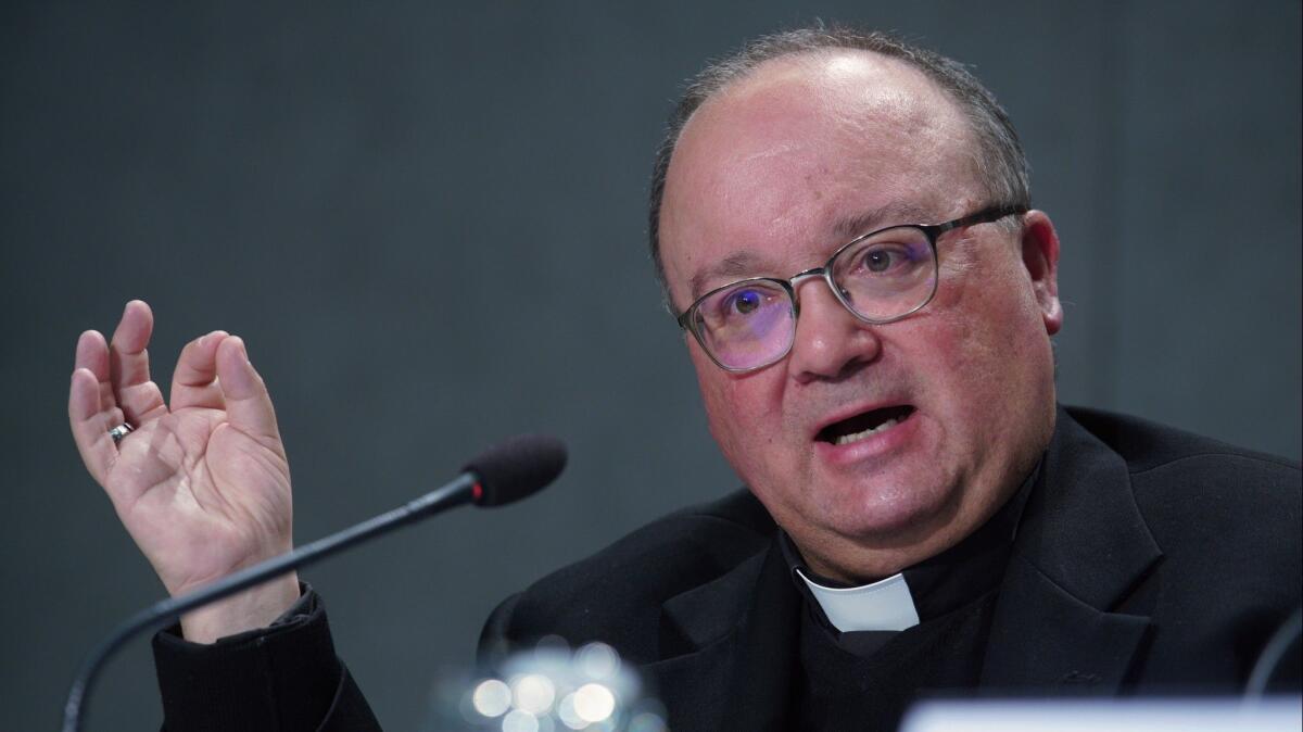 Archbishop Charles Scicluna, the Vatican's top abuse investigator, speaks Thursday to introduce new rules requiring priests and nuns to report accusations of sex abuse by clergy to church officials.