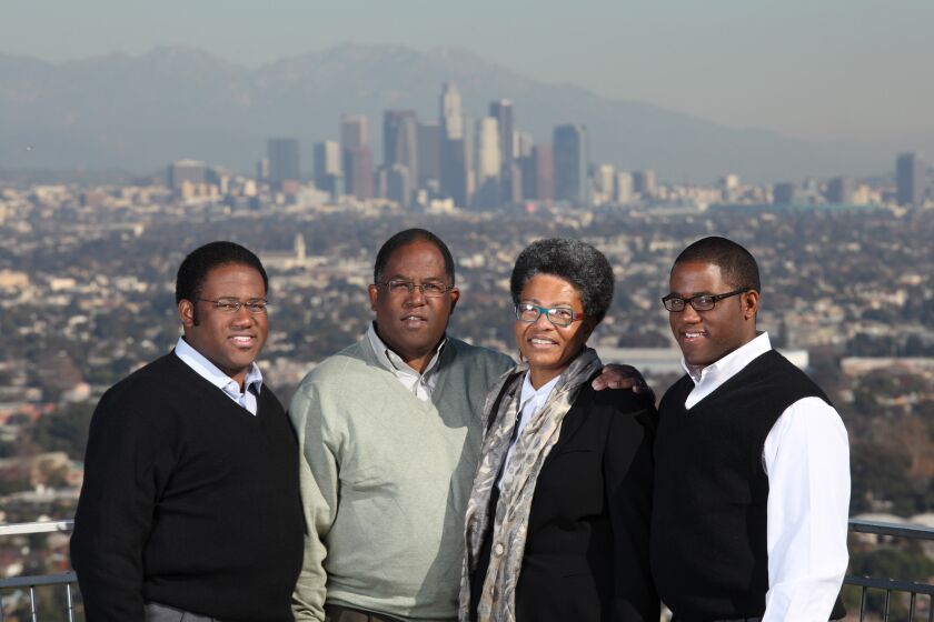 Sebastian Ridley-Thomas, left, a son of Los Angeles County Supervisor Mark Ridley-Thomas, is running for a state Assembly seat. He is pictured here in a 2011 family photo with his father, mother Avis Ridley-Thomas and twin brother Sinclair Ridley-Thomas. Credit: Leroy Hamilton, photo courtesy of the Sebastian Ridley-Thomas campaign.