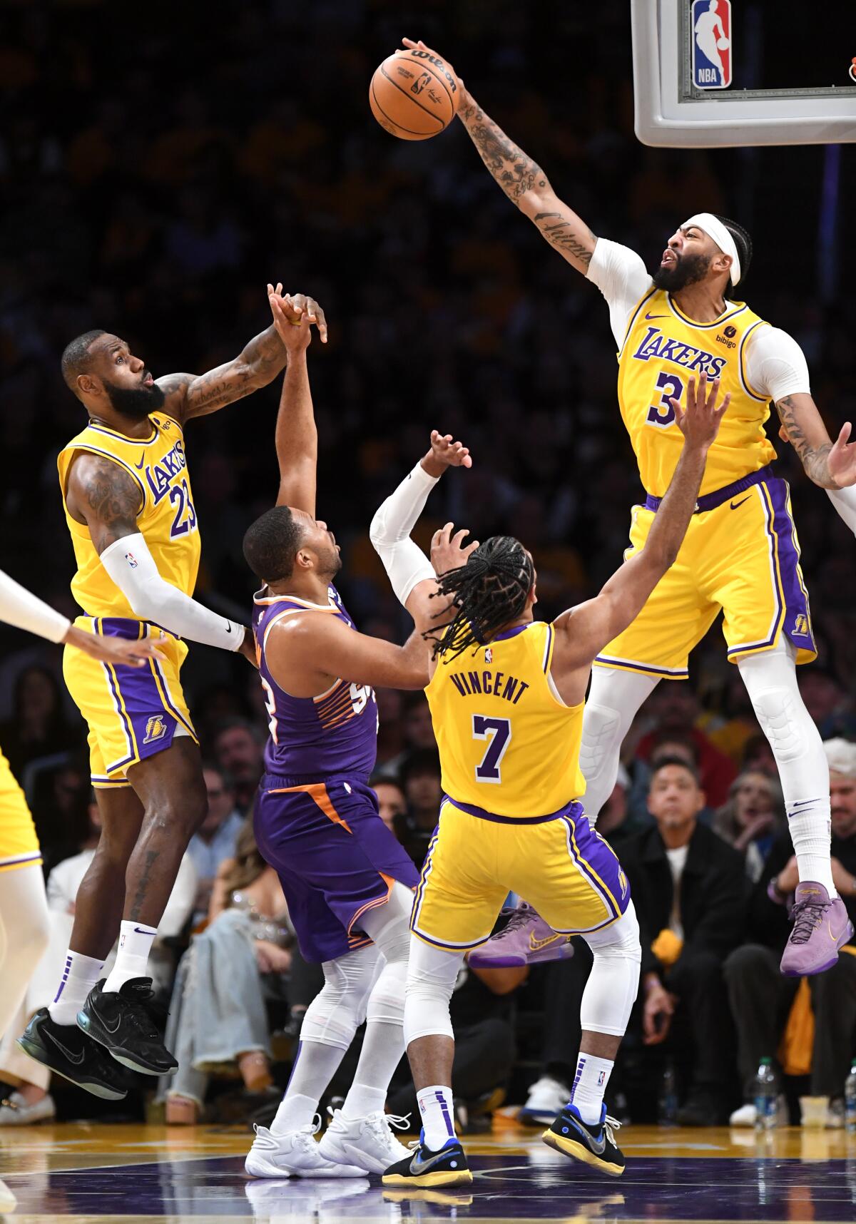 The Lakers' Anthony Davis blocks a shot by Eric Gordon.