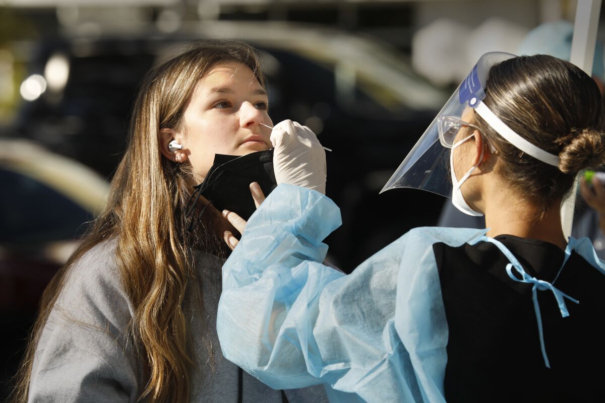 Woman gets nose swab test