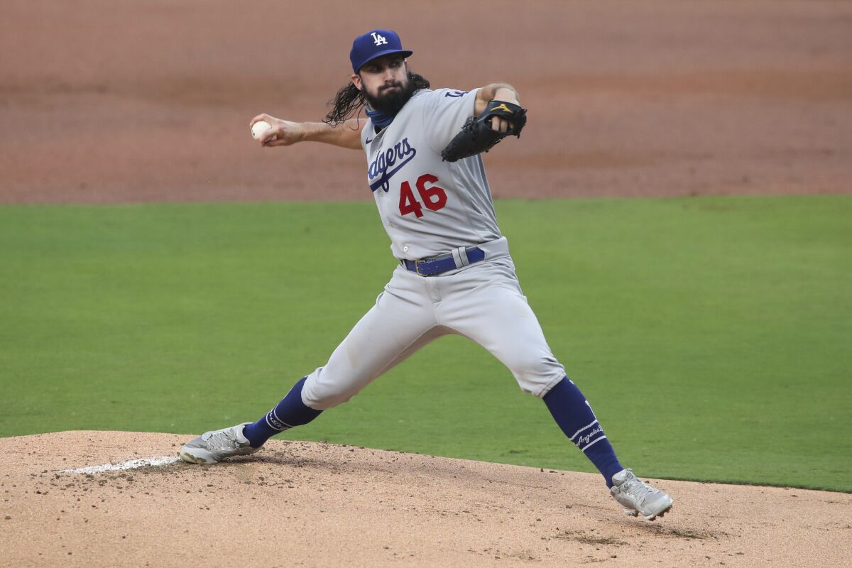 Dodgers starting pitcher Tony Gonsolin delivers a pitch against the San Diego Padres.