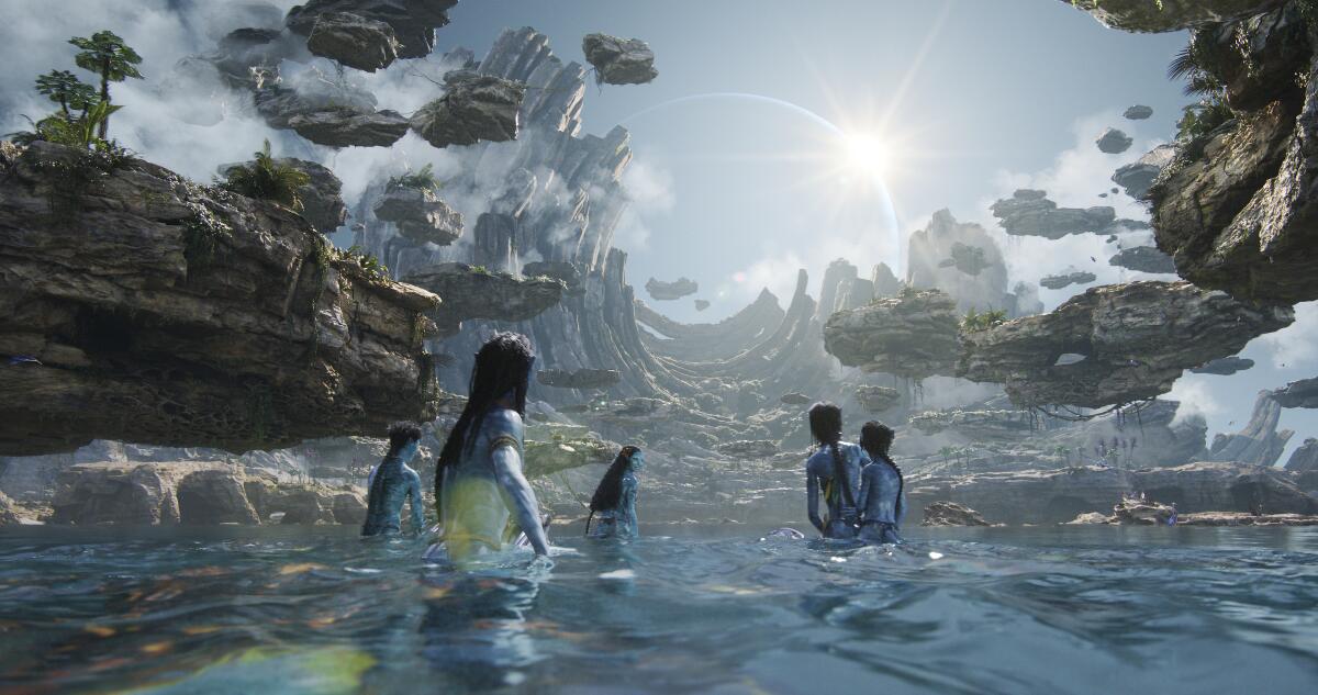 A scene from "Avatar: The Way of Water" shows the reef dwellers known as the Metkayina in the water.